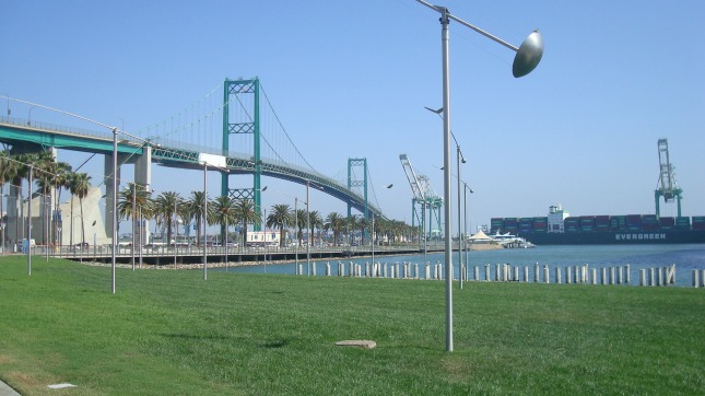 A park at the water's edge, with the Vincent Thomas Bridge in the background.